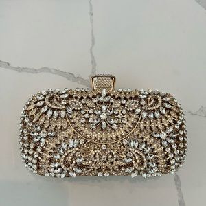 Gold glitter clutch with removable chain NWOT